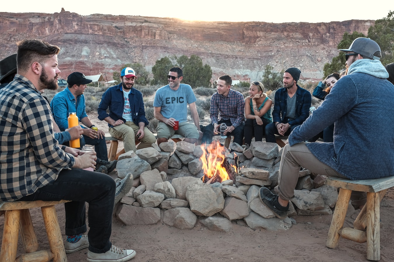 A group of people talking to each other